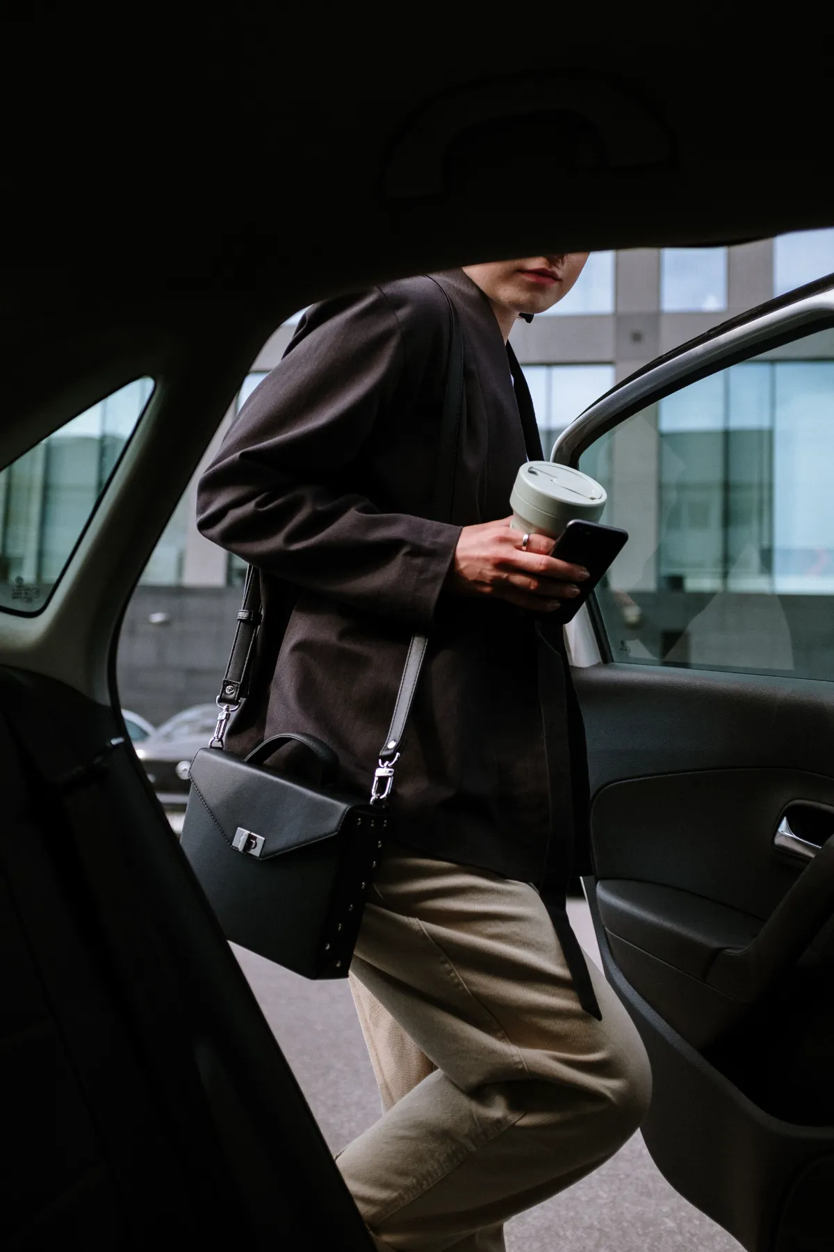 Passenger entering a private hire vehicle for a comfortable journey