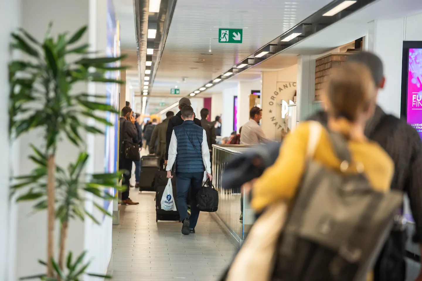 Passenger with luggage arriving at London City Airport